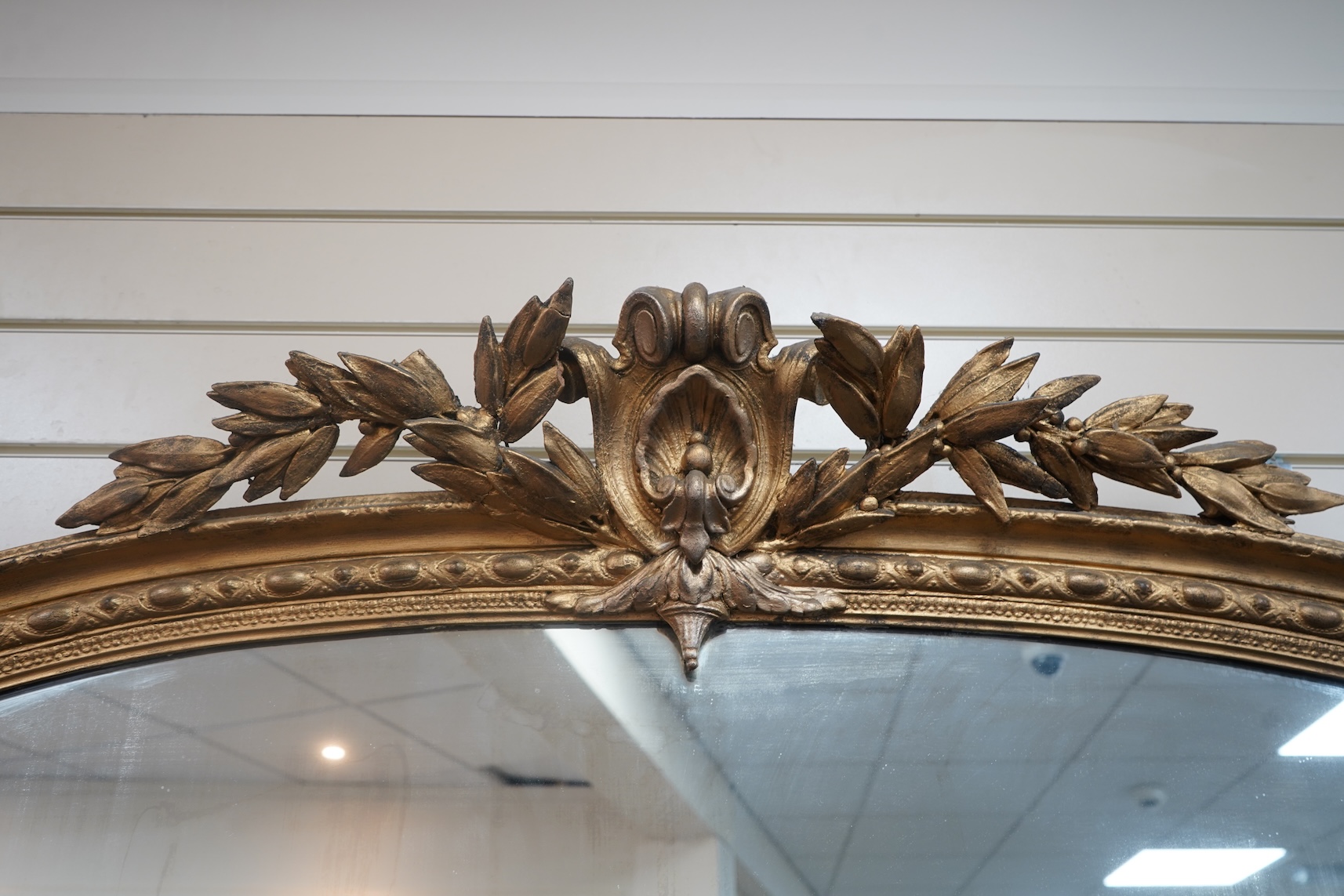 A Victorian giltwood and composition overmantel mirror